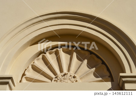 Architectural decorative lunette with a sunburst shell relief Architectural decorative lunette with a sunburst shell relief 143612111
