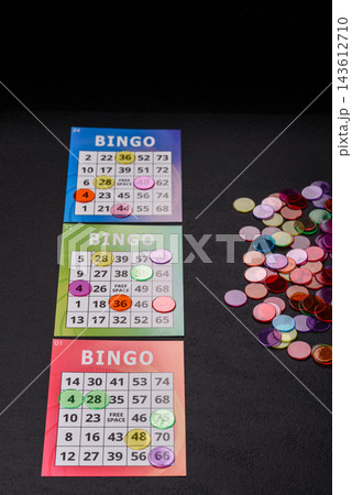 Colorful bingo cards for fun, gaming, and Christmas leisure. Bingo cards Colorful bingo cards for fun, gaming, and Christmas leisure. Bingo cards 143612710