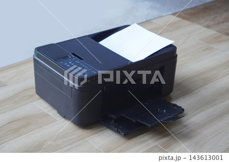 antique digital black printers and white paper on wooden floor, blur white wall background, technology, object, comfortable, work, copy space antique digital black printers and white paper on wooden floor, blur white wall background, technology, object, comfortable, work, copy space 143613001