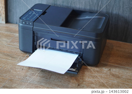 closeup black printers and white paper on wooden floor, wall grey marble background, technology, object, comfortable, work, copy space closeup black printers and white paper on wooden floor, wall grey marble background, technology, object, comfortable, work, copy space 143613002