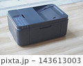 closeup digital black printers on wooden floor, blur marble background, technology, object, comfortable, work, copy space 143613003
