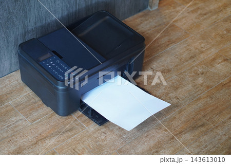 top view black printers and white paper on brown wooden floor, wall grey marble background, technology, object, comfortable, work, copy space top view black printers and white paper on brown wooden floor, wall grey marble background, technology, object, comfortable, work, copy space 143613010