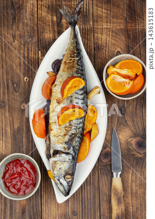 Gourmet baked mackerel with orange and mandarin Gourmet baked mackerel with orange and mandarin 143615183
