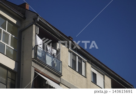 House Facade Against Blue Sky House Facade Against Blue Sky 143615691