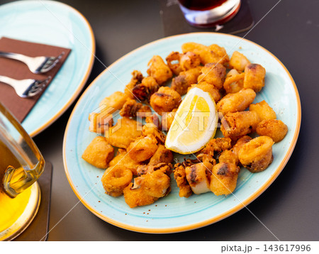 Spanish seafood dish battered fried baby squid 143617996
