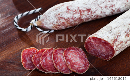 Catalan sausage Longaniza with sliced pieces Catalan sausage Longaniza with sliced pieces 143618013