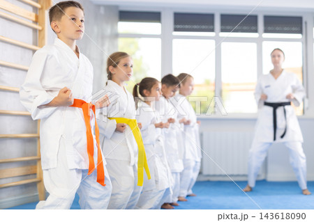Kids during karate training. Martial arts. Active lifestyle concept 143618090