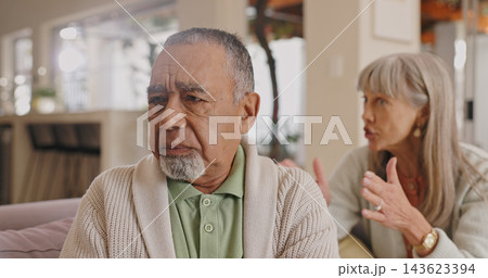 Elderly couple, angry and arguing in lounge, couch and discussion in retirement, weekend and upset in house. Talking, old man and woman in living room, fighting and people in apartment and marriage Elderly couple, angry and arguing in lounge, couch and discussion in retirement, weekend and upset in house. Talking, old man and woman in living room, fighting and people in apartment and marriage 143623394