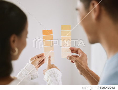Couple, home and color palette for planning for interior design, woman and pointing for improvement idea. Renovation, inspiration and wall decor with man, relationship bonding and house project 143623548