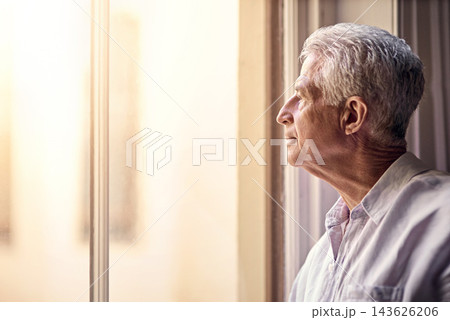 Senior man, home and thinking on window with memories or reflection on retirement, break and chill. Thoughts, calm and relax or peaceful as elderly person with mindfulness, perspective and nostalgia 143626206