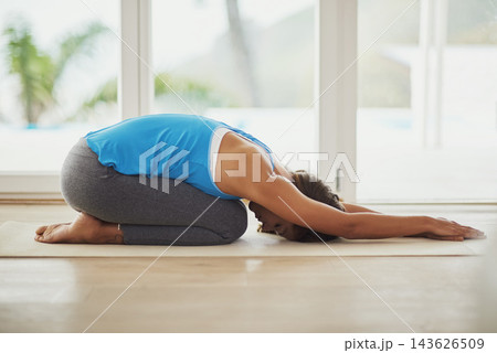 Pilates, stretch workout and woman in home for health, wellness and floor exercise. Yoga, zen chakra and calm yogi for strong spiritual training, holistic workout or peace in apartment living room 143626509