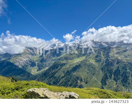 Clear summer view of Mont Blanc from alpine slopes, France Clear summer view of Mont Blanc from alpine slopes, France 143627323