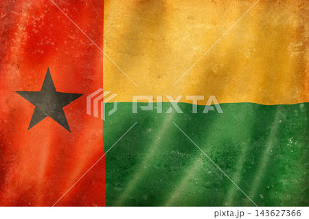 Old vintage flag of Guinea-Bissau, worn and stained 143627366