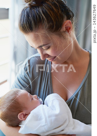 Mom, newborn and smile for care in home for support, love and trust for growth and child development. Parent, kid and mother with toddler for childcare with bonding, childhood memories and happy 143627649