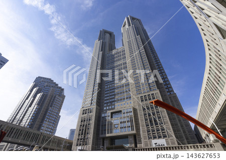 Tokyo, Japan - Feb 5, 2026 : Unidentified people visit Tokyo Metropolitan Government Office Building with blue sky in Tokyo, Japan on Feb 5, 2026. 143627653