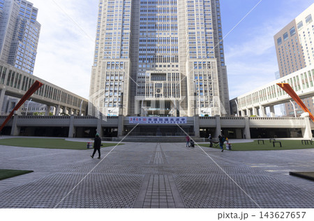 Tokyo, Japan - Feb 5, 2026 : Unidentified people visit Tokyo Metropolitan Government Office Building with blue sky in Tokyo, Japan on Feb 5, 2026. 143627657