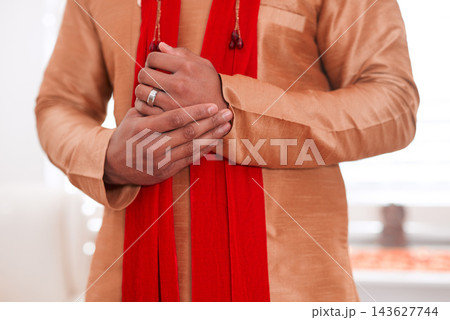 Indian, wedding and clothes for attire of person, culture and traditional in closeup and groom. Stylish, fashion and suit for man in morning for marriage, selection and accessory by tailor in Mumbai Indian, wedding and clothes for attire of person, culture and traditional in closeup and groom. Stylish, fashion and suit for man in morning for marriage, selection and accessory by tailor in Mumbai 143627744