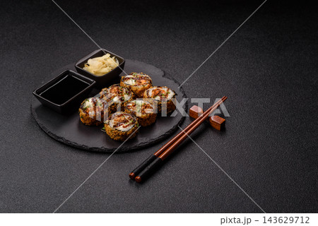 Hot tempura sushi rolls with tuna, rice, soy sauce, wasabi, and ginger. Hot tuna tempura roll Hot tempura sushi rolls with tuna, rice, soy sauce, wasabi, and ginger. Hot tuna tempura roll 143629712