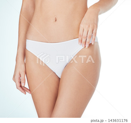 Body, health and woman in underwear closeup in studio for wellness, beauty or lose weight on white background. Panty, stomach detox or girl model with lingerie for glow, skincare and slimming results 143631176