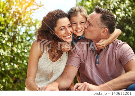 Family, happy and child hug outdoor with bonding, care or support for security trust together in backyard. Smile, woman and man or kid embrace moment, love and sunshine vacation of childhood memory Family, happy and child hug outdoor with bonding, care or support for security trust together in backyard. Smile, woman and man or kid embrace moment, love and sunshine vacation of childhood memory 143631201