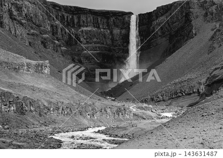 Monochrome Hengifoss waterfall and rugged river valley in summer Iceland 143631487