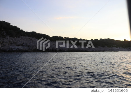 Rocky Seabird Island in Adriatic Sea at Sunset - Supetar Island Habitat near Cavtat Croatia Rocky Seabird Island in Adriatic Sea at Sunset - Supetar Island Habitat near Cavtat Croatia 143631606