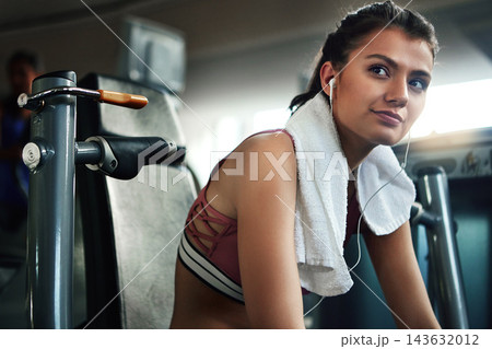 Gym, towel and woman with workout break, prepare and thinking for health performance. Sport, earphones and female athlete ready for fitness, training and exercise thoughts for strength Gym, towel and woman with workout break, prepare and thinking for health performance. Sport, earphones and female athlete ready for fitness, training and exercise thoughts for strength 143632012