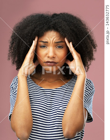 Stress, portrait and woman with headache in studio overwhelmed by mistake, pressure or conflict trauma on pink background. Anxiety, face and girl model with emoji migraine, crisis or vertigo disaster 143632775