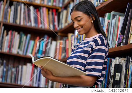 University, reading and woman with books in library for research, studying and learning. Education, college and happy female student with textbooks for knowledge, information and literature project University, reading and woman with books in library for research, studying and learning. Education, college and happy female student with textbooks for knowledge, information and literature project 143632975