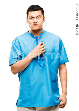 Nurse, portrait and man with funny face in studio for healthcare, stethoscope or diagnosis on white background. Health, lungs and physician for treatment, pulmonary disease or medical evaluation Nurse, portrait and man with funny face in studio for healthcare, stethoscope or diagnosis on white background. Health, lungs and physician for treatment, pulmonary disease or medical evaluation 143633594