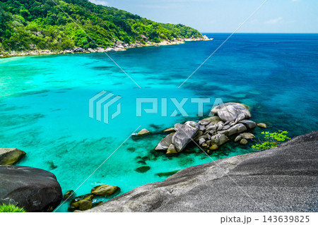 bay in sea near an island with blue water bay in sea near an island with blue water 143639825