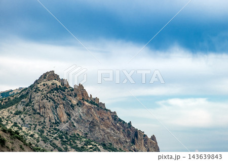 stone cliffs against the blue sky stone cliffs against the blue sky 143639843
