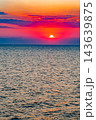 red sunset sun over the sea 143639875