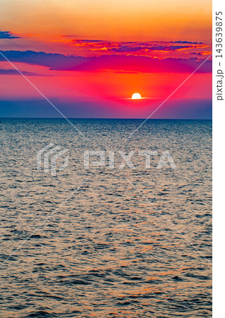 red sunset sun over the sea 143639875