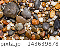 background of pebbles on the beach top view 143639878