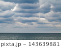 solid clouds above the sea surface 143639881