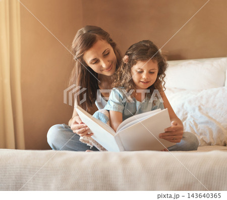 Mom, book and child reading on bed at family home with learning, storytelling and love in the morning. Development, education and youth fairytale with language and literature in bedroom with girl Mom, book and child reading on bed at family home with learning, storytelling and love in the morning. Development, education and youth fairytale with language and literature in bedroom with girl 143640365