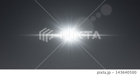 Glowing light beam shining on a dark background Glowing light beam shining on a dark background 143640500