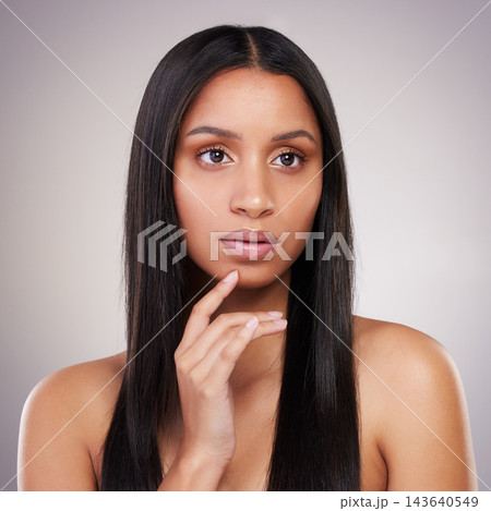 Hair care, thinking and woman in studio for keratin treatment, shampoo or cosmetics on white background. Hairstyle, body and hand of model with beauty for satisfaction, growth or collagen shine Hair care, thinking and woman in studio for keratin treatment, shampoo or cosmetics on white background. Hairstyle, body and hand of model with beauty for satisfaction, growth or collagen shine 143640549