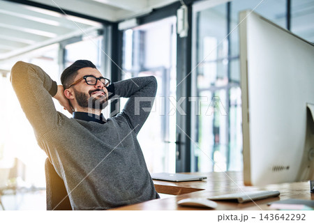 Businessman, stretching and relax at desk with computer, smile and break in office. Financial consultant, worker and rest with success in workplace for deadline, target and happiness for deal 143642292
