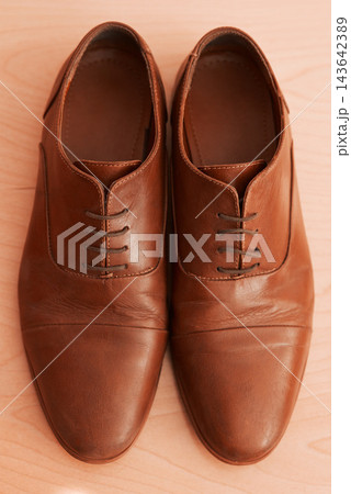Fashion, wedding shoes and home with preparation, footwear and getting ready for formal event. Oxford style, dressing room and from above with fancy, luxury and classy brand with floor in house Fashion, wedding shoes and home with preparation, footwear and getting ready for formal event. Oxford style, dressing room and from above with fancy, luxury and classy brand with floor in house 143642389