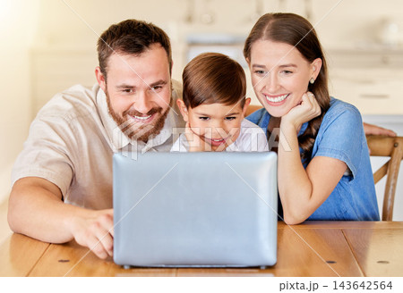 Bonding, family and laptop for elearning of child, mother and father with kid, watch and smile for education. Home, table and parents together with boy, knowledge and video for school and weekend Bonding, family and laptop for elearning of child, mother and father with kid, watch and smile for education. Home, table and parents together with boy, knowledge and video for school and weekend 143642564