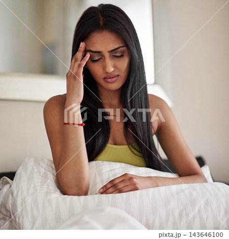 Headache, woman and bed in morning with illness, stress and frustrated in bedroom. Tired, Indian girl and migraine at home for pain, unwell and stress from fatigue, sick and tension with hand on head Headache, woman and bed in morning with illness, stress and frustrated in bedroom. Tired, Indian girl and migraine at home for pain, unwell and stress from fatigue, sick and tension with hand on head 143646100