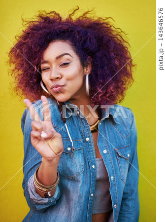 Studio, portrait and girl with wink, peace sign and isolated by yellow background. Fashion model, streetwear and jewelry with stylish outfit, v symbol and emoji with pout expression or personality 143646576