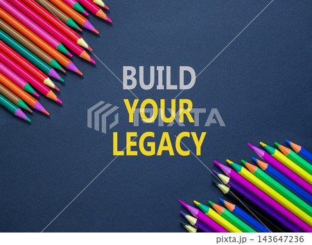 Build your legacy words symbol. Concept words Build your legacy on beautiful black paper. Beautiful black background. Colored pencils. Business build your legacy concept. Copy space. 143647236
