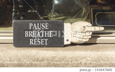 Pause breathe reset symbol. Concept words Pause breathe reset on beautiful black information sign. Beautiful shopfront background. Business support motivational pause breathe reset concept. Copy space Pause breathe reset symbol. Concept words Pause breathe reset on beautiful black information sign. Beautiful shopfront background. Business support motivational pause breathe reset concept. Copy space 143647660