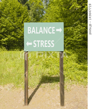 Balance instead stress words symbol. Concept words Balance Stress on beautiful green road sign. Beautiful green forest background. Business medical psychology balance stress concept. Copy space. Balance instead stress words symbol. Concept words Balance Stress on beautiful green road sign. Beautiful green forest background. Business medical psychology balance stress concept. Copy space. 143647719
