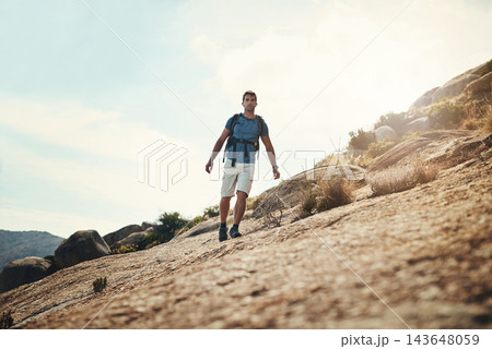 Hiker, man and nature for travel, climbing and person in mountains, fitness and sports mockup. Walking, healthy and adventure with supplies in bag, rocks and explore in forest and active or survival 143648059