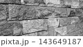 Angled Black and White Rough Stone Brick Wall Texture 143649187
