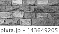 Monochrome Split-Face Stone Brick Wall Texture Background 143649205